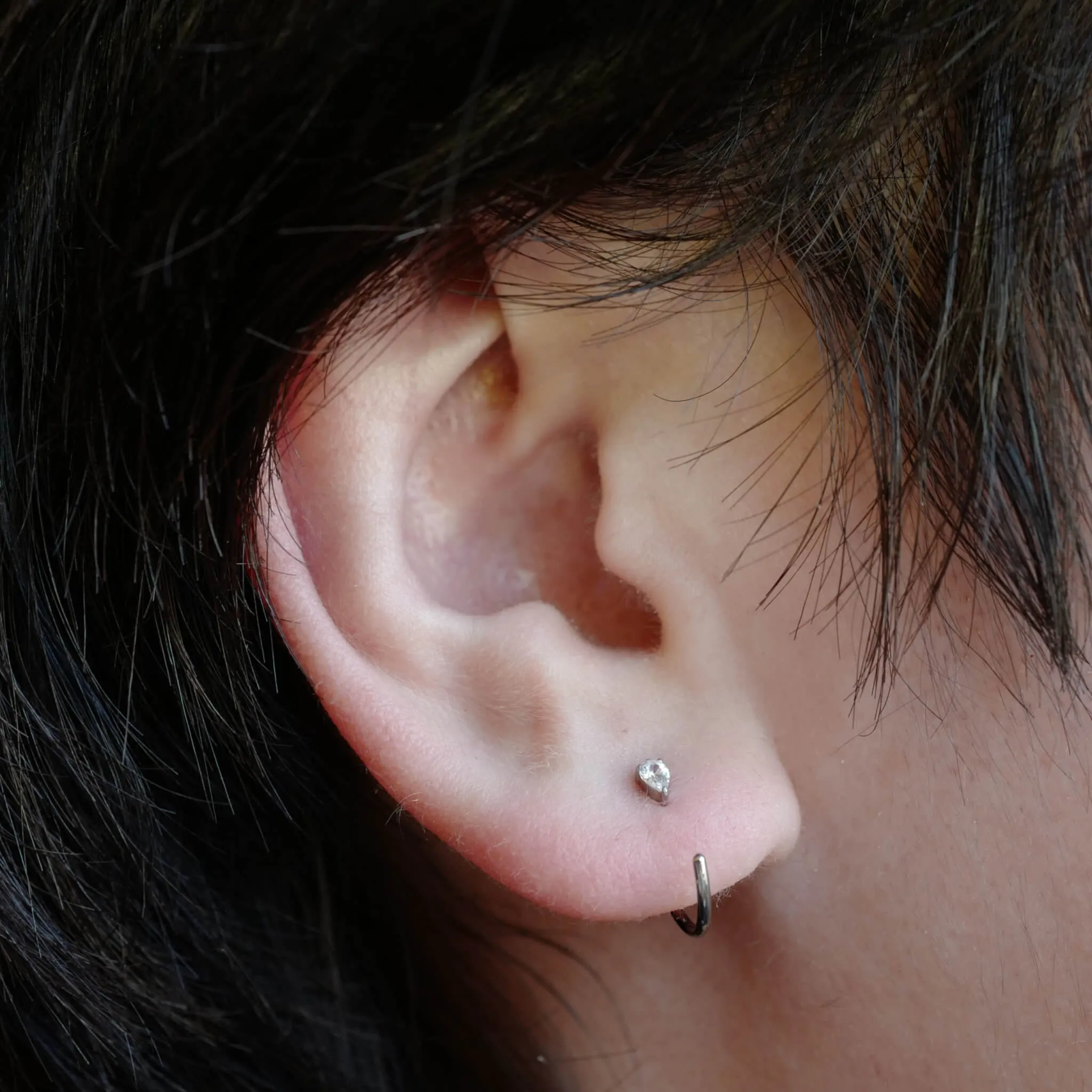 Dewdrop Huggie Earrings in Titanium sold by Maison Miru product image thumbnail 4