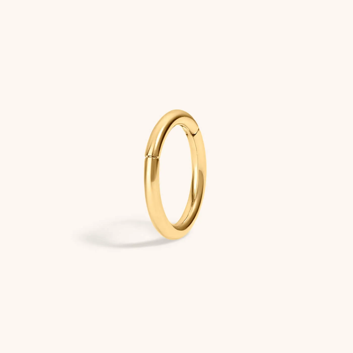 Classic Cartilage Hoop in 14k Gold sold by Maison Miru