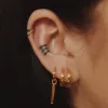 Classic Cartilage Hoop in 14k Gold sold by Maison Miru
