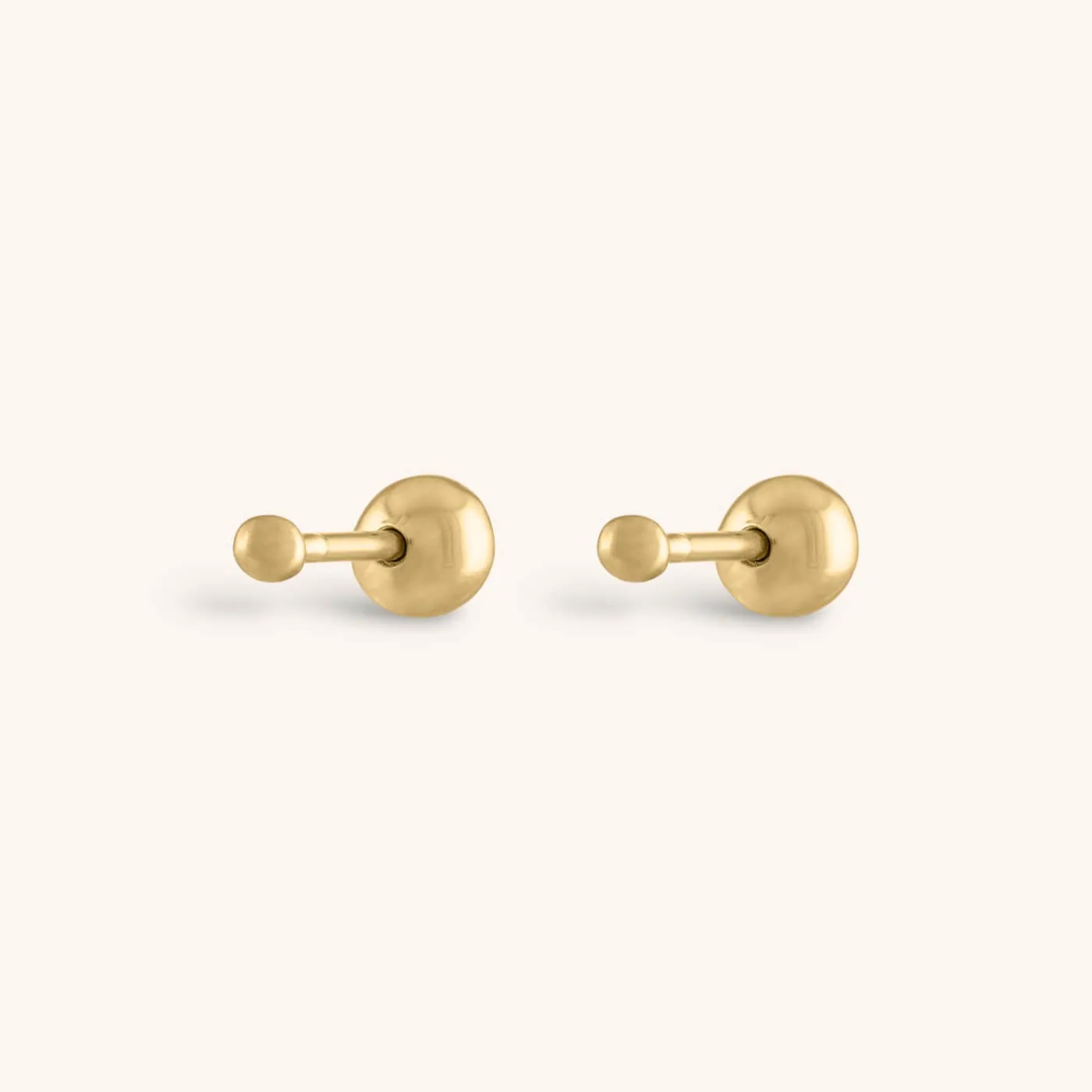 Tiny Secret Ball Back Earrings in 14k Gold sold by Maison Miru