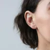 Tiny Secret Studs in 14k Gold sold by Maison Miru