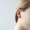 Tiny Secret Studs in 14k Gold sold by Maison Miru