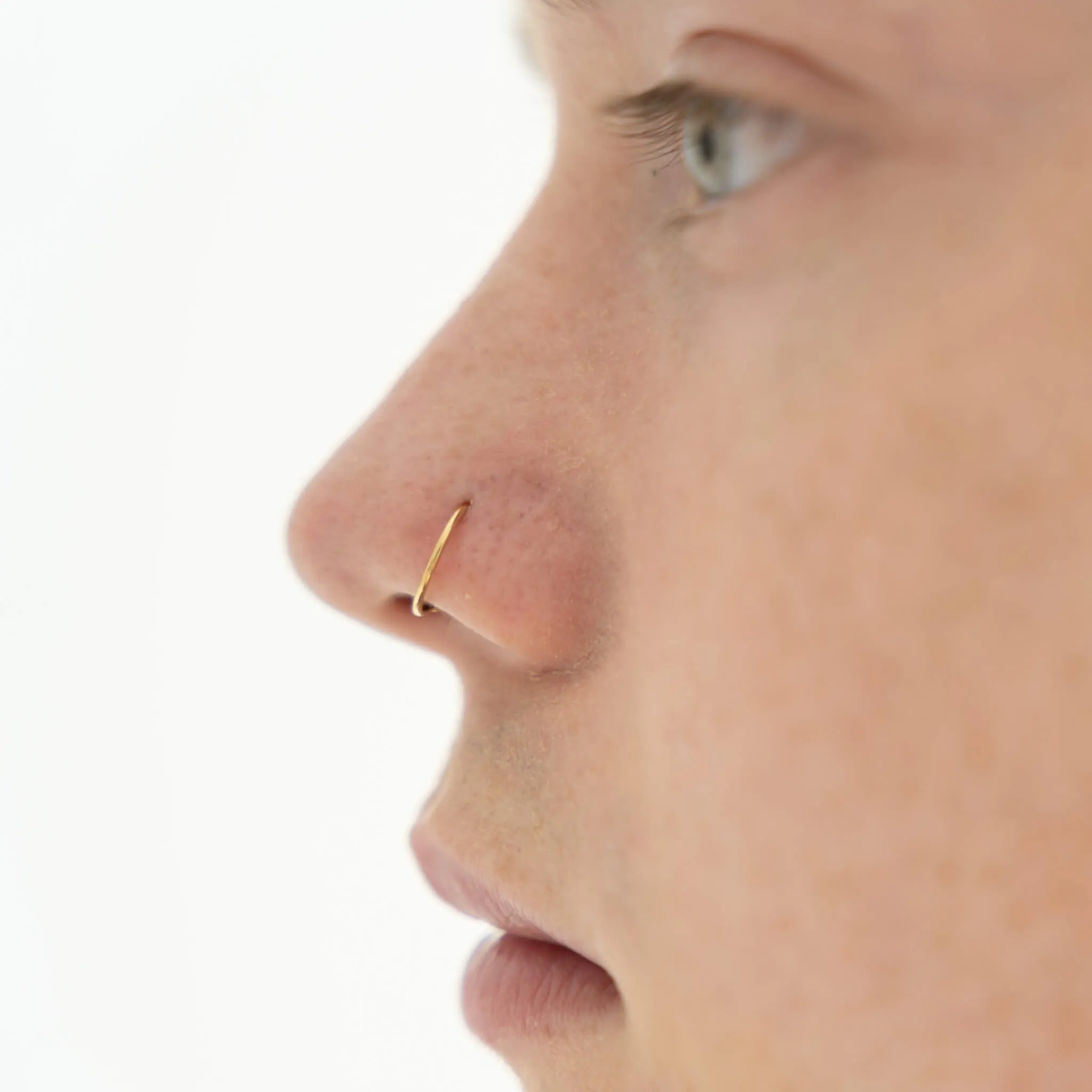 Tiny Secret Nose Hoop Ring in 14k Gold sold by Maison Miru product image thumbnail 3
