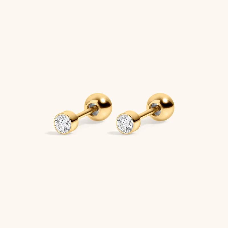 Tiny Crystal Studs in Titanium sold by Maison Miru