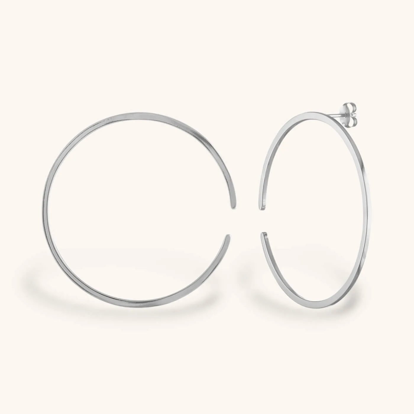 Sample Item: Large Illusion Hoops in Sterling Silver sold by Maison Miru