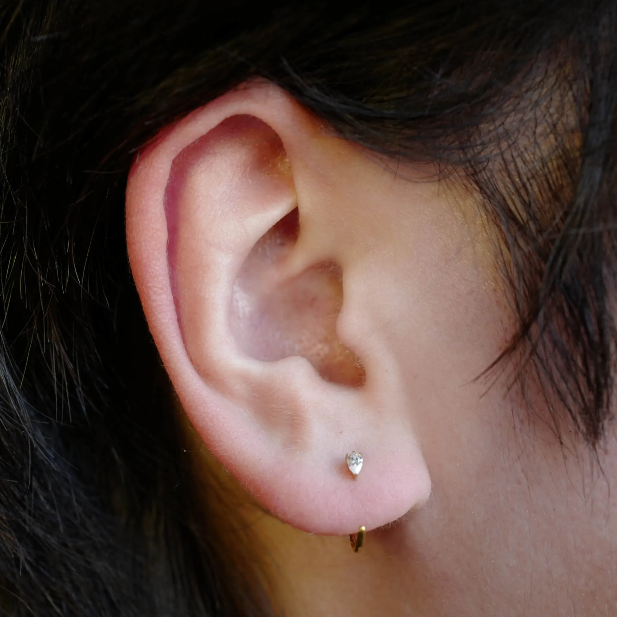 Sample Item: Dewdrop Huggie Earrings in Titanium sold by Maison Miru product image thumbnail 2