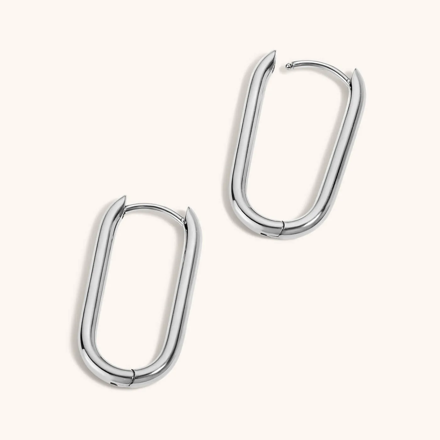 Sample Item: Halo Oval Hoop Earrings in Titanium sold by Maison Miru product image thumbnail 5