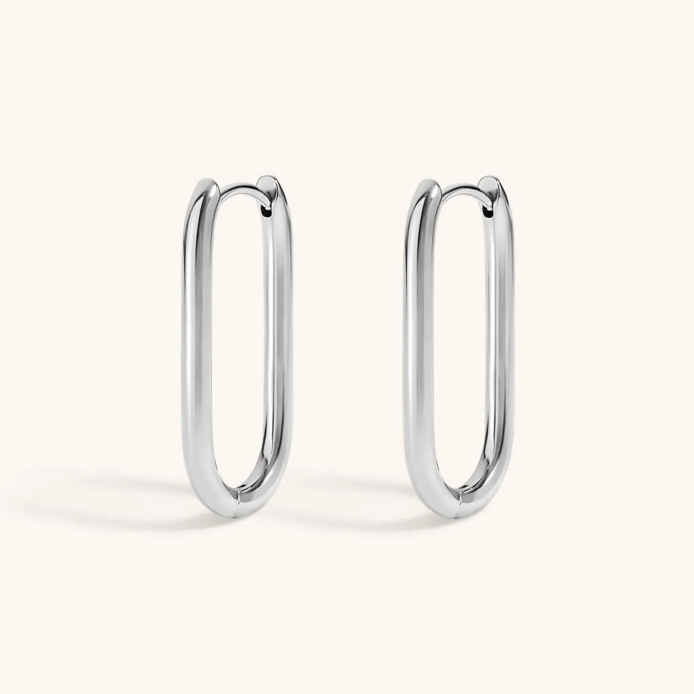 Sample Item: Halo Oval Hoop Earrings in Titanium sold by Maison Miru product image thumbnail 4