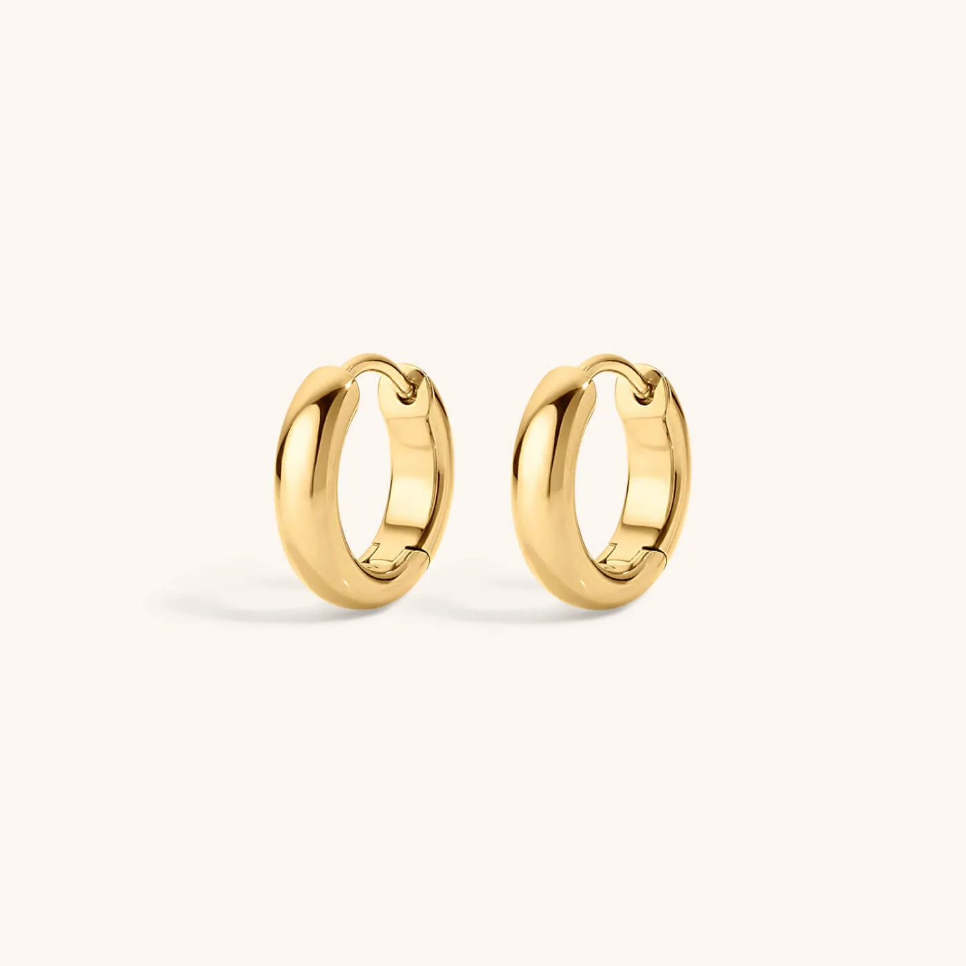 Bold Huggie Hoops in Titanium sold by Maison Miru