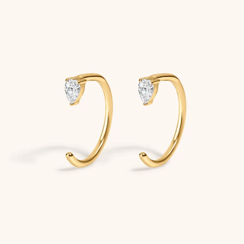 Crystal Pear Open Huggie Hoops in Titanium sold by Maison Miru