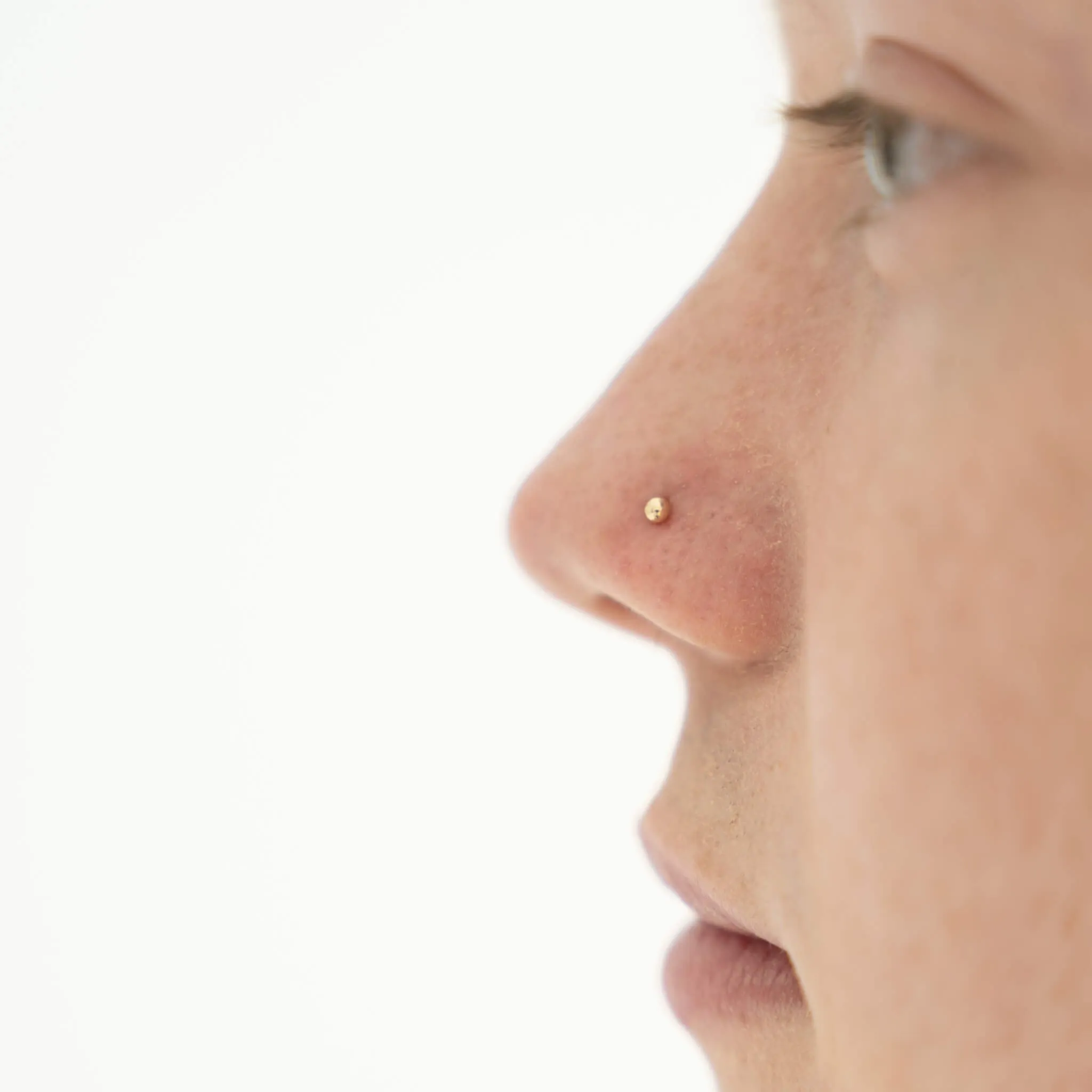 Tiny Secret Stud L-Shape Nose Ring in 14k Gold sold by Maison Miru product image thumbnail 4