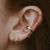 Sample Item: Classic Huggie Hoops sold by Maison Miru