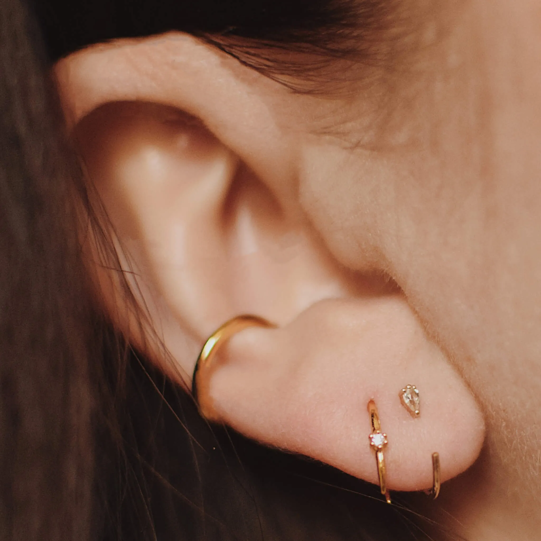 Dewdrop Huggie Earrings in 14k Gold sold by Maison Miru product image thumbnail 2
