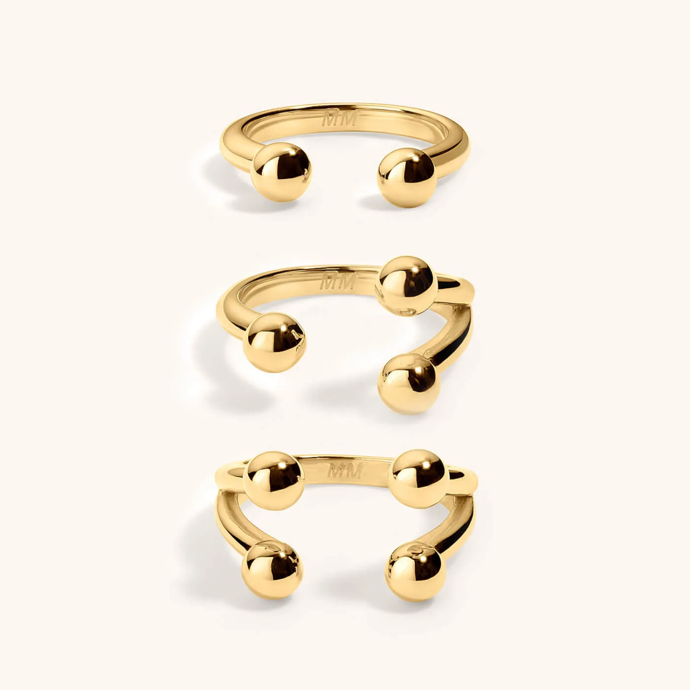 Floating Sphere Stacking Ring Trio sold by Maison Miru