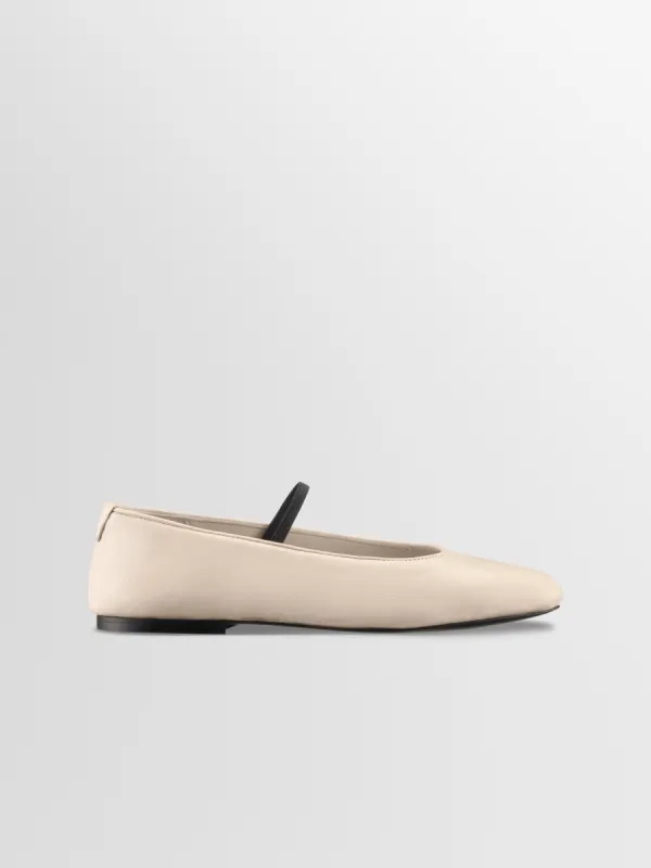 Aurora in Ecru sold by Koio