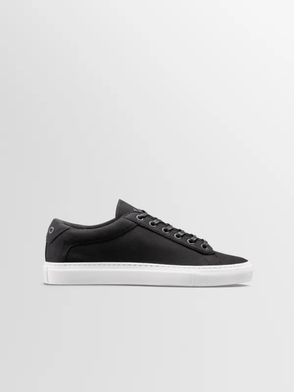 Capri Canvas Sneaker in Onyx Canvas sold by Koio