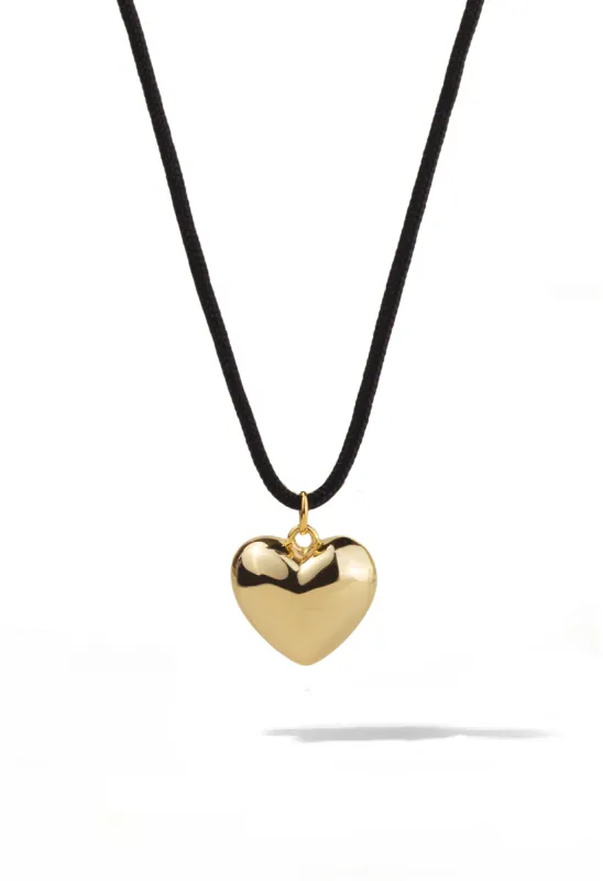 Gold Puffed Heart Cord Necklace sold by Oomiay