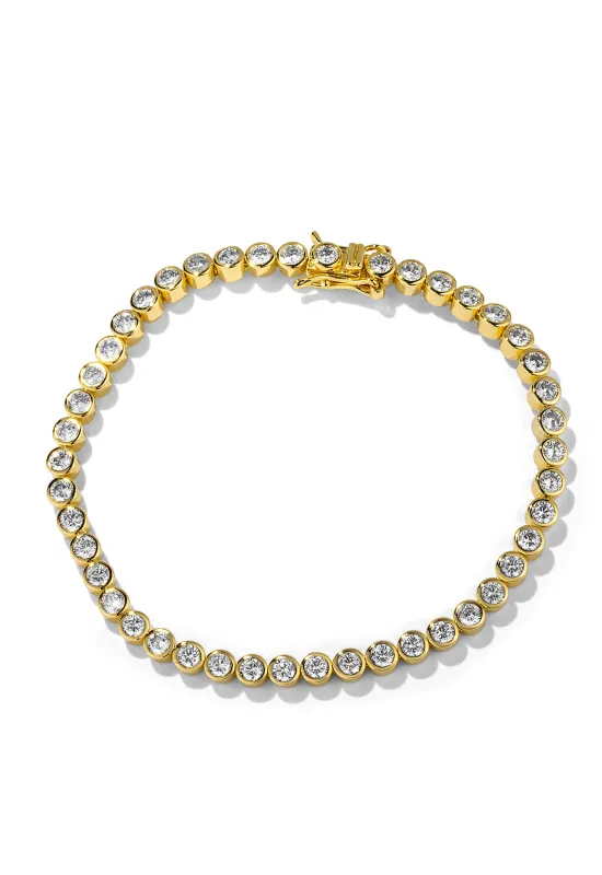 Gold Bezel Tennis Bracelet sold by Oomiay