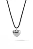 Silver Puffed Heart Cord Necklace sold by Oomiay