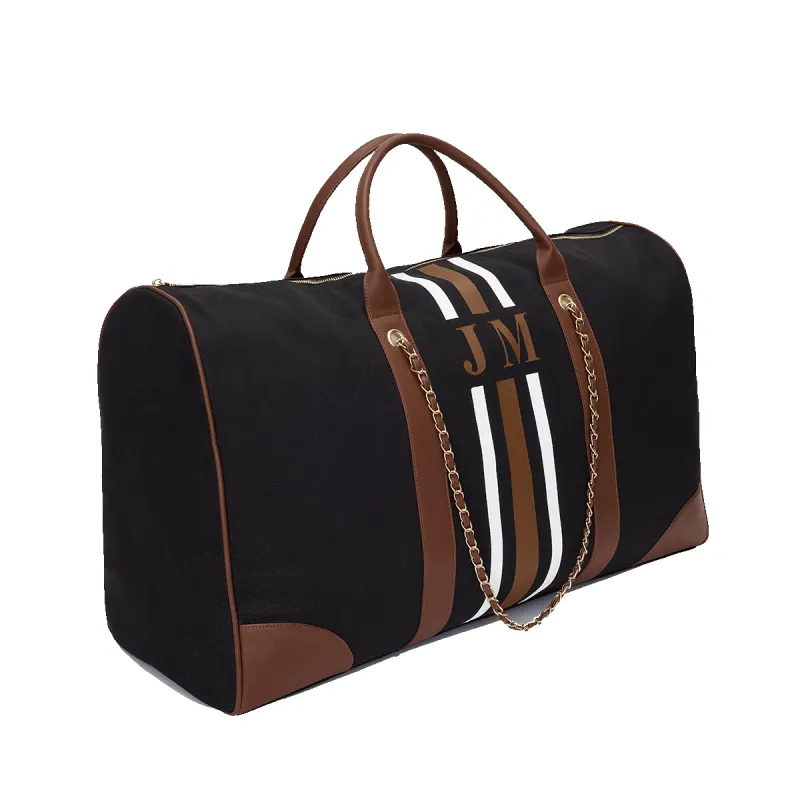 The Lily 'Take Me Away' - Black and Tan sold by Lily and Bean