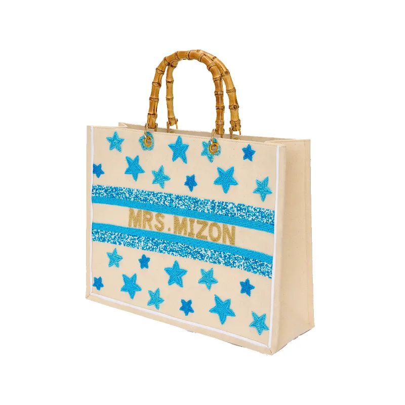 The Juliana Cluster Beaded Tote sold by Lily and Bean