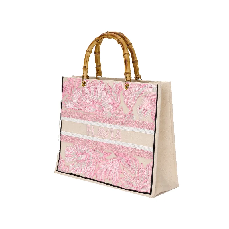 The Juliana Tropical Pink Beaded Tote sold by Lily and Bean
