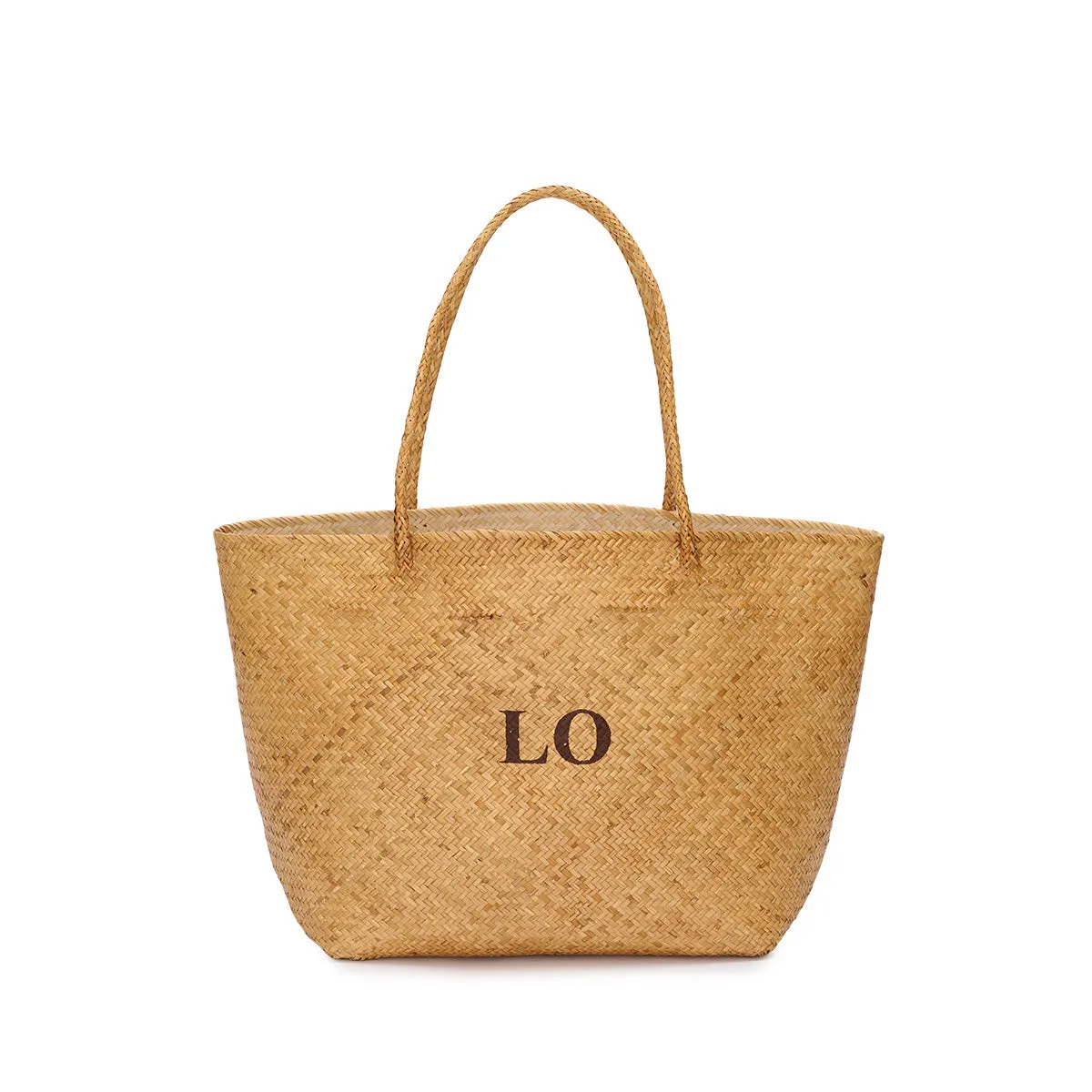 The Dark Straw Beach Tote sold by Lily and Bean