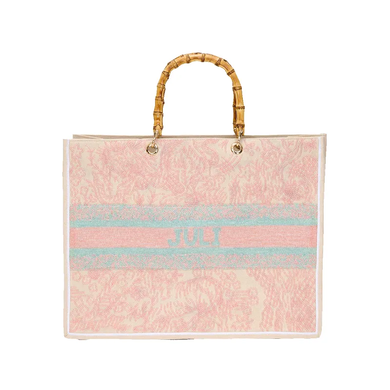 The Juliana Pastel Pink and Green Beaded Tote sold by Lily and Bean