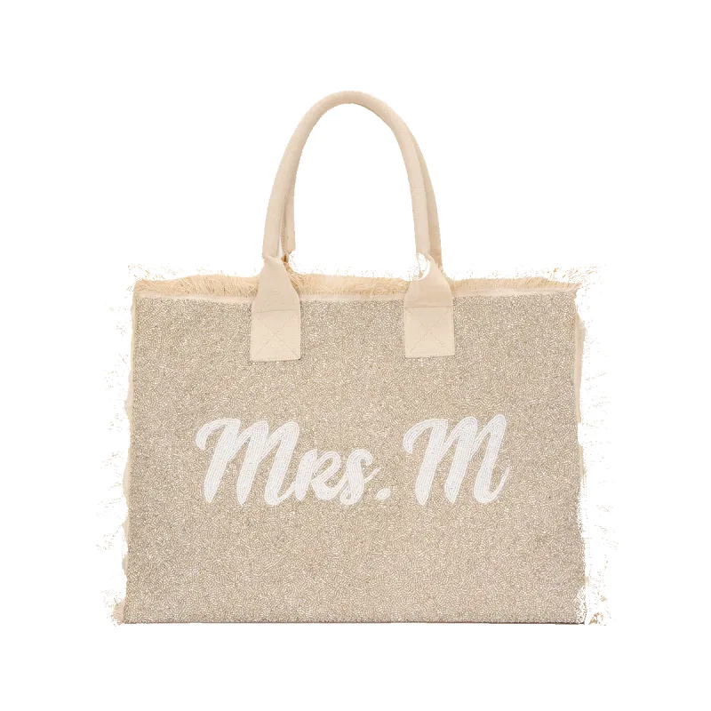 The Fringe Beaded Tote sold by Lily and Bean