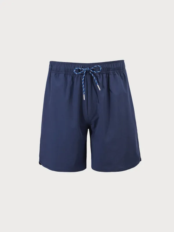 The Navy Blue Beach Men's 7" Swimming Trunks sold by BERLOOK