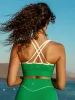 Green X Cross Sports Bra sold by BERLOOK