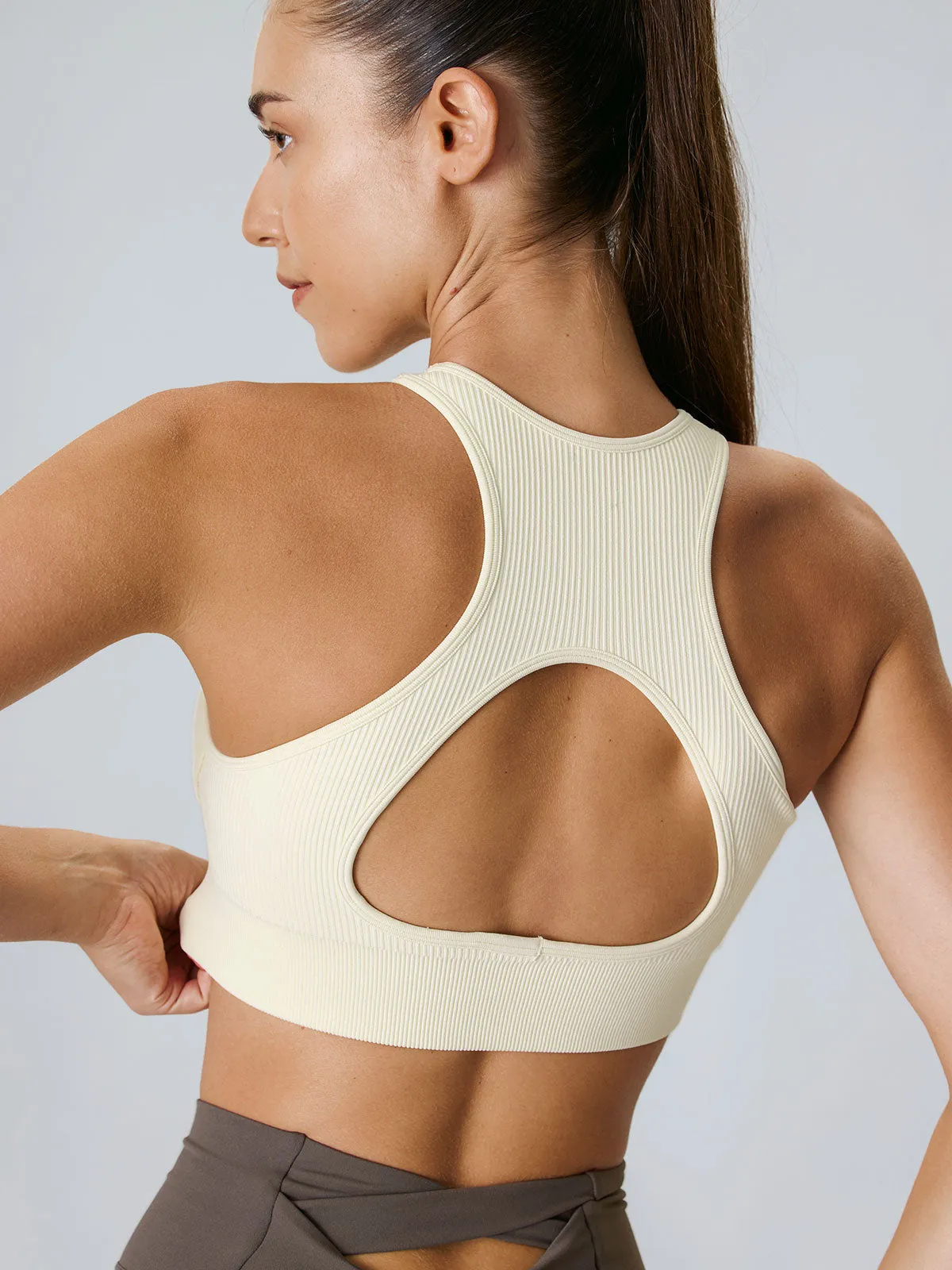 Off White Cut Out Sports Bra - Medium Support sold by BERLOOK