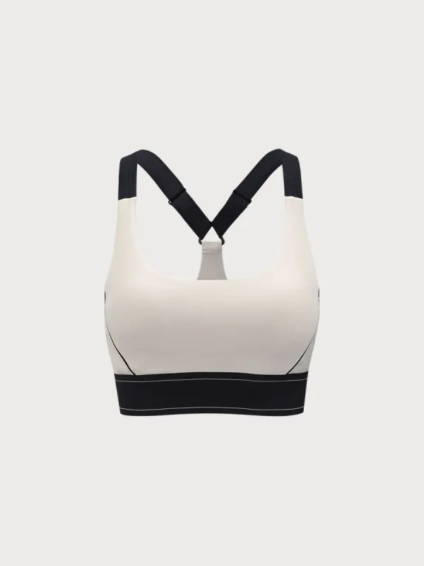 Off White Contrast X Cross Sports Bra - Light Support sold by BERLOOK
