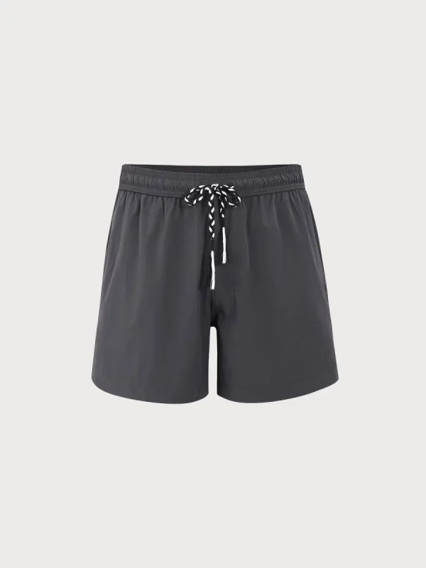 The Dark Grey Beach Men's 7" Swimming Trunks sold by BERLOOK