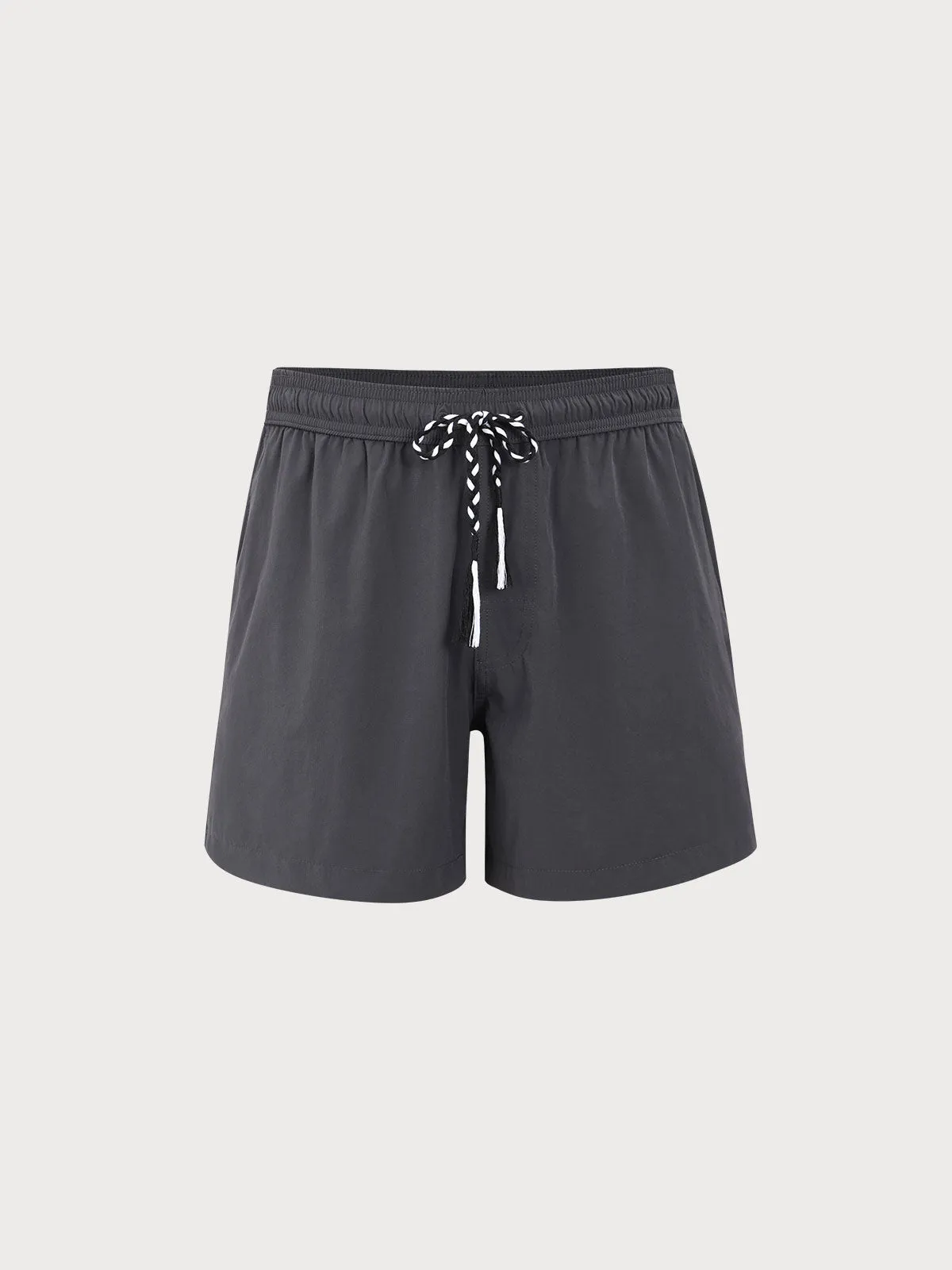 The Dark Grey Beach Men's 7" Swimming Trunks sold by BERLOOK