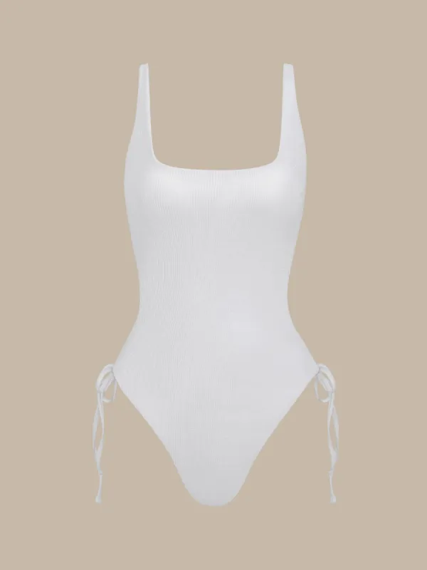White X Cross One-Piece Swimsuit sold by BERLOOK