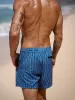 Hapnix® - The Blue Stripe Men's 5" Swim Trunks sold by BERLOOK