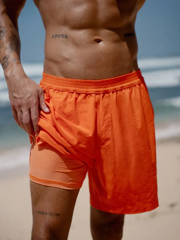 Hapnix® - The Orange Men's 7" Swim Trunks sold by BERLOOK