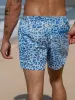 Hapnix® - The Blue Leopard Men's 5" Swim Trunks sold by BERLOOK