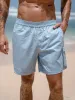 Hapnix® - The Light Blue Men's 5" Swim Trunks sold by BERLOOK