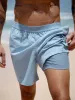 Hapnix® - The Light Blue Men's 5" Swim Trunks sold by BERLOOK