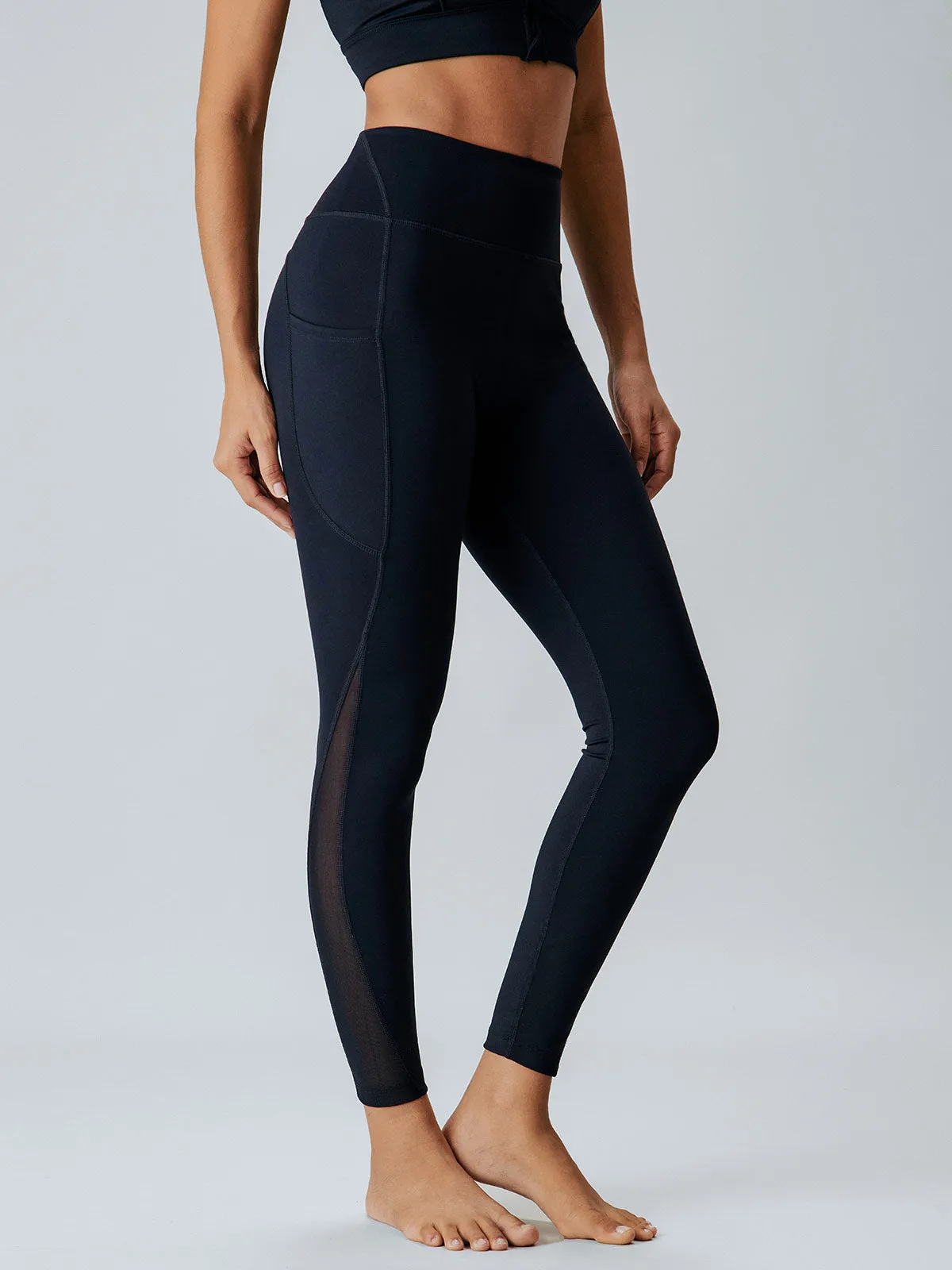 Black High-Waist Mesh Pocket Leggings 26" sold by BERLOOK