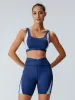Navy Side Contrast Sports Bra sold by BERLOOK