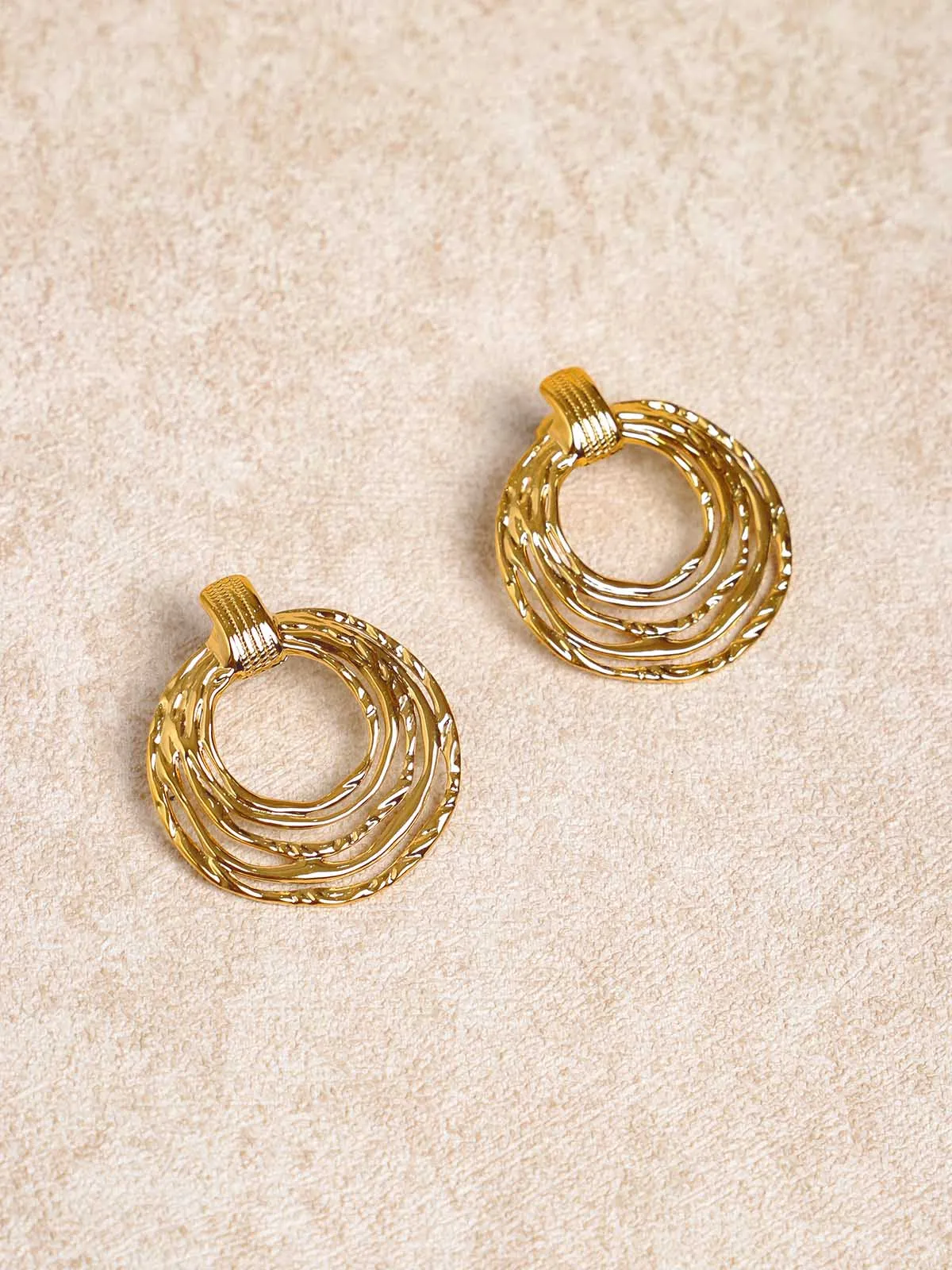 Golden Twisted Loop Earrings sold by BERLOOK