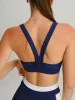 Navy Racerback Sports Bra sold by BERLOOK