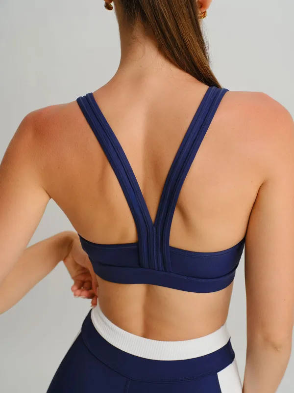 Navy Racerback Sports Bra sold by BERLOOK