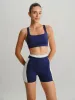 Navy Racerback Sports Bra sold by BERLOOK