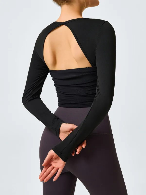 Black Cutout Ruched Long Sleeve Top sold by BERLOOK