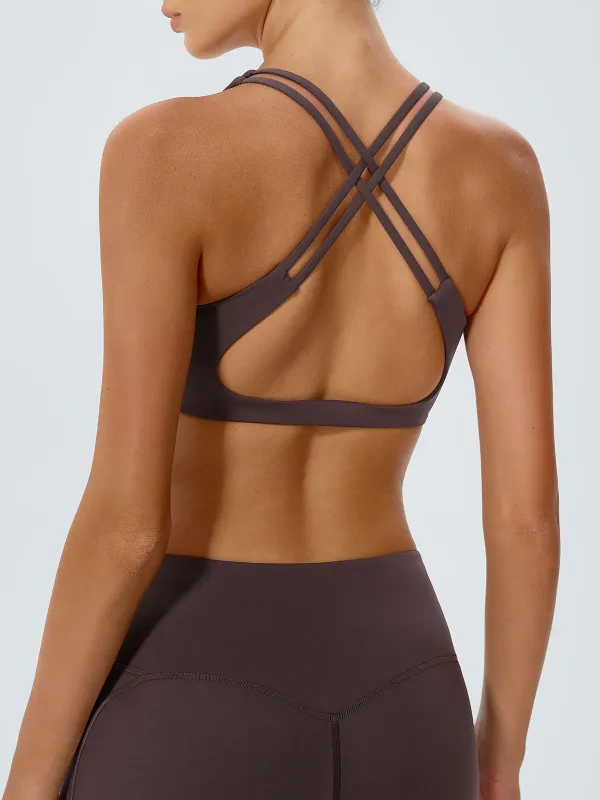 Purple Cutout X-Cross Sports Bra sold by BERLOOK