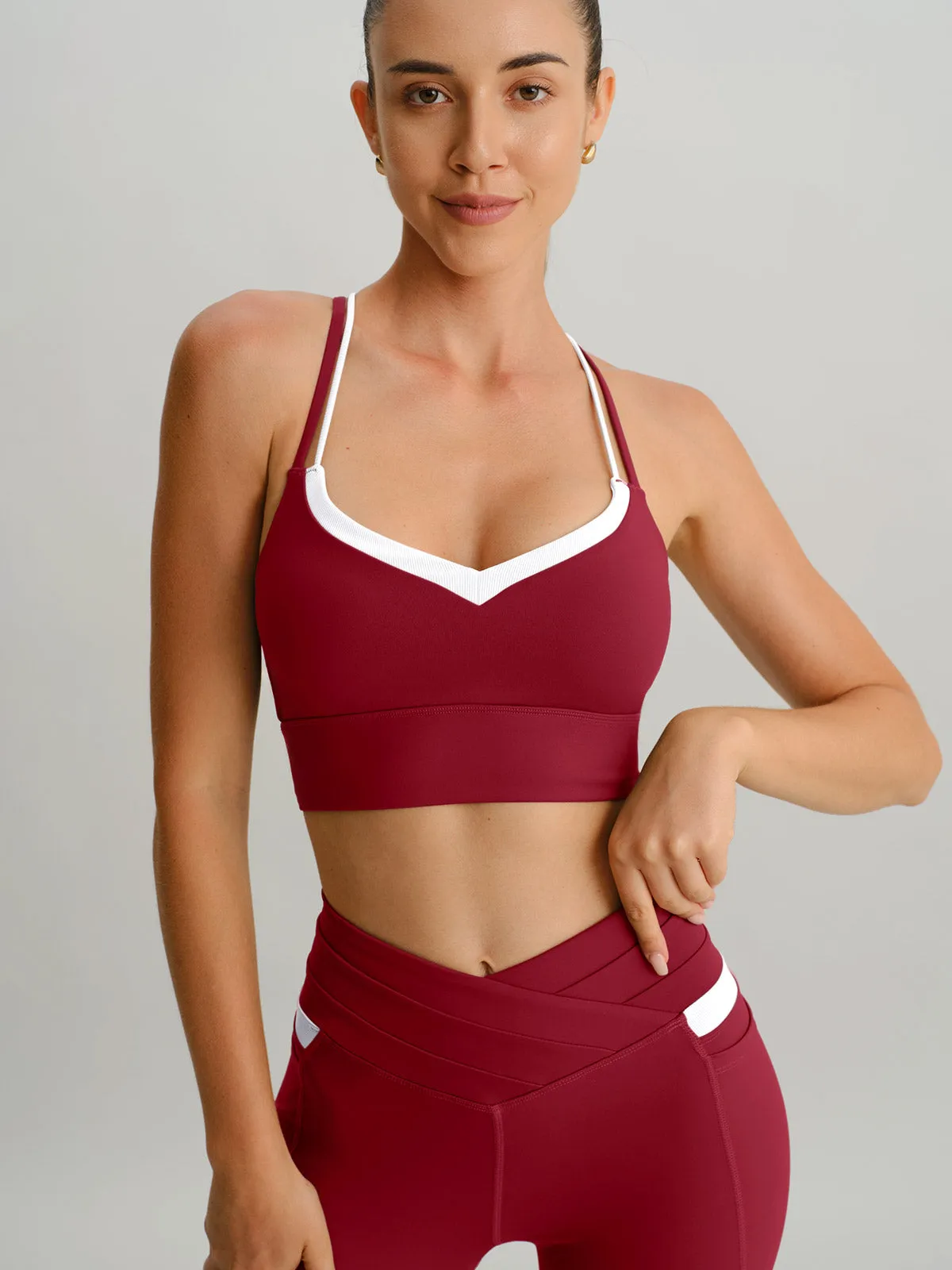 Wine Red Contrast X Cross Sports Bra sold by BERLOOK